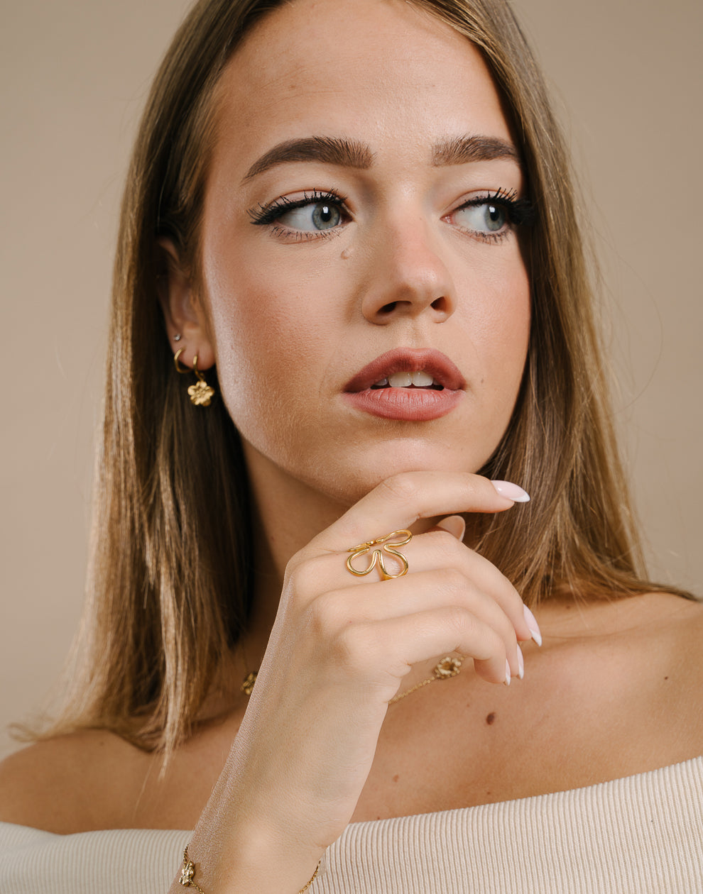 Ring open bloem goudkleurig