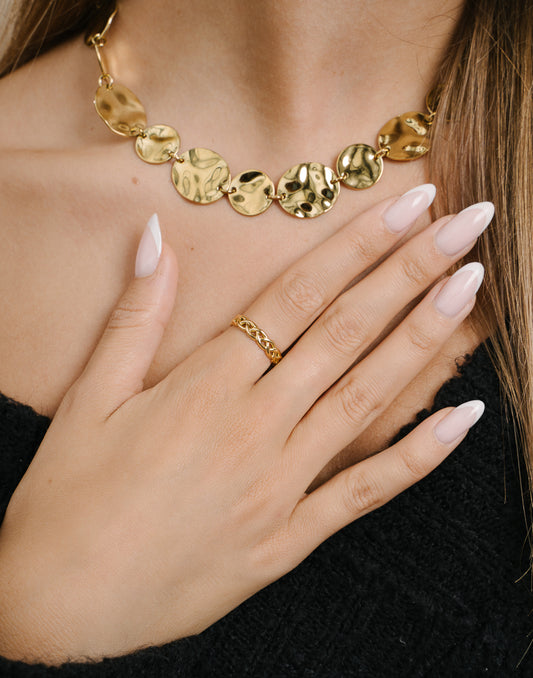 Ring gevlochten patroon goudkleurig