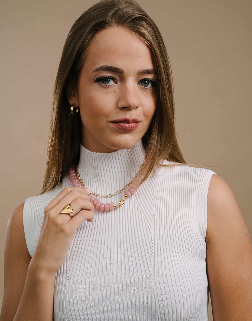 Ovale Perlenkette mit rosa Verschluss