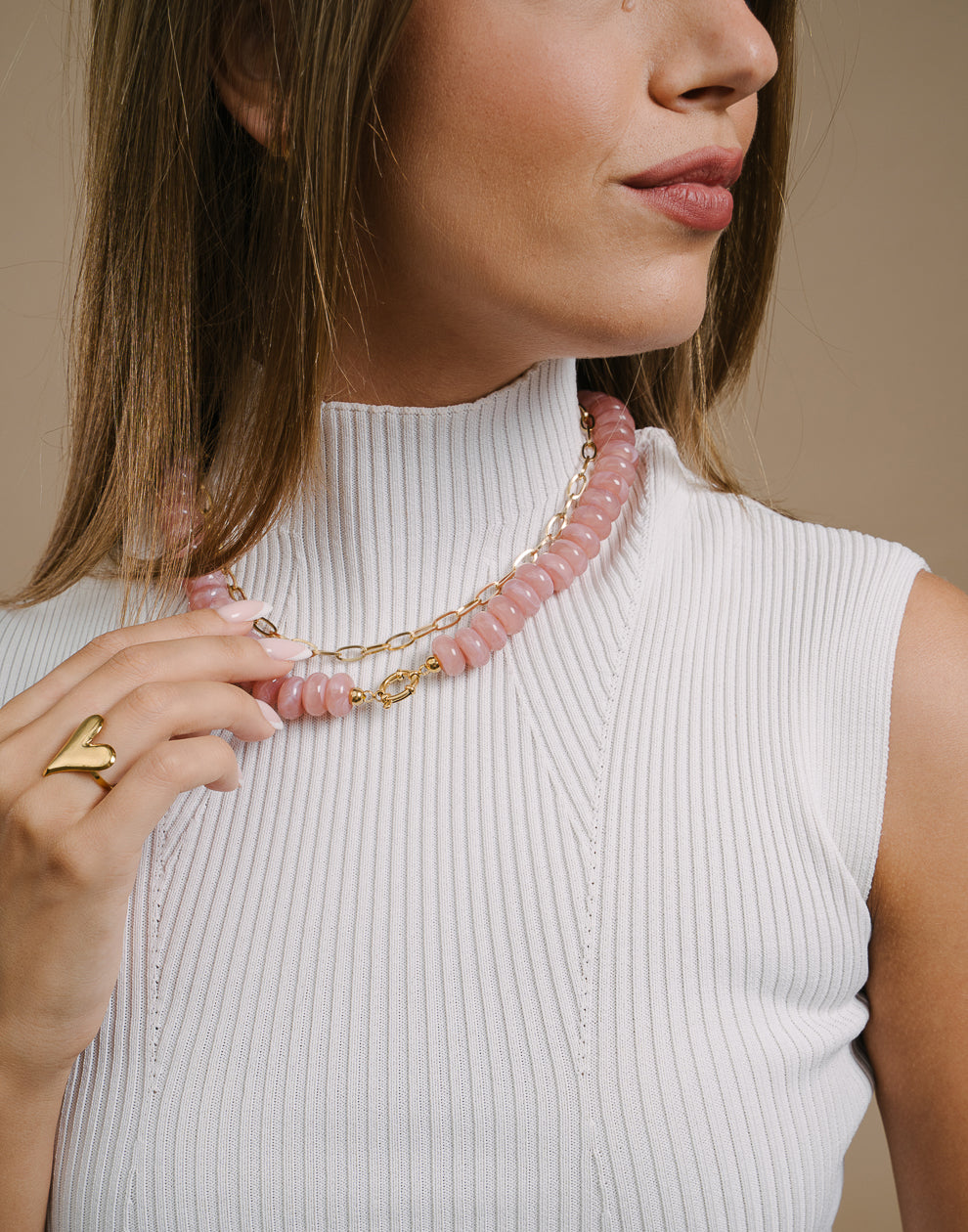 Ovale Perlenkette mit rosa Verschluss