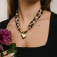 Leopard print ketting met kralen en hart