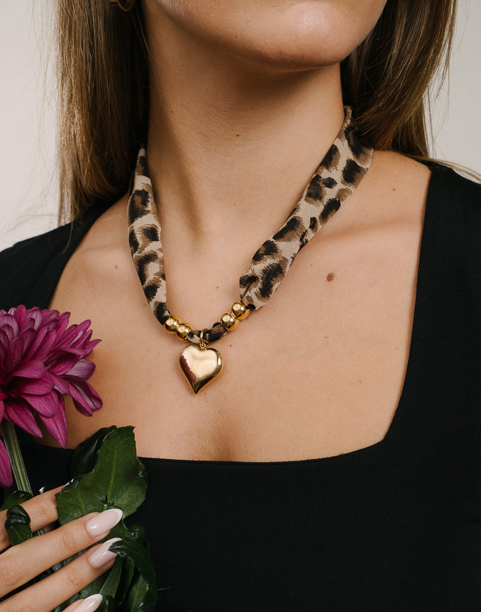 Leopard print ketting met kralen en hart
