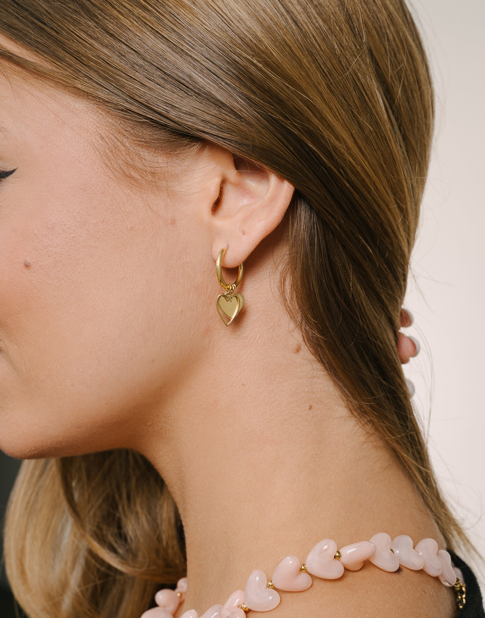 Goldfarbene Doppelherz-Ohrringe