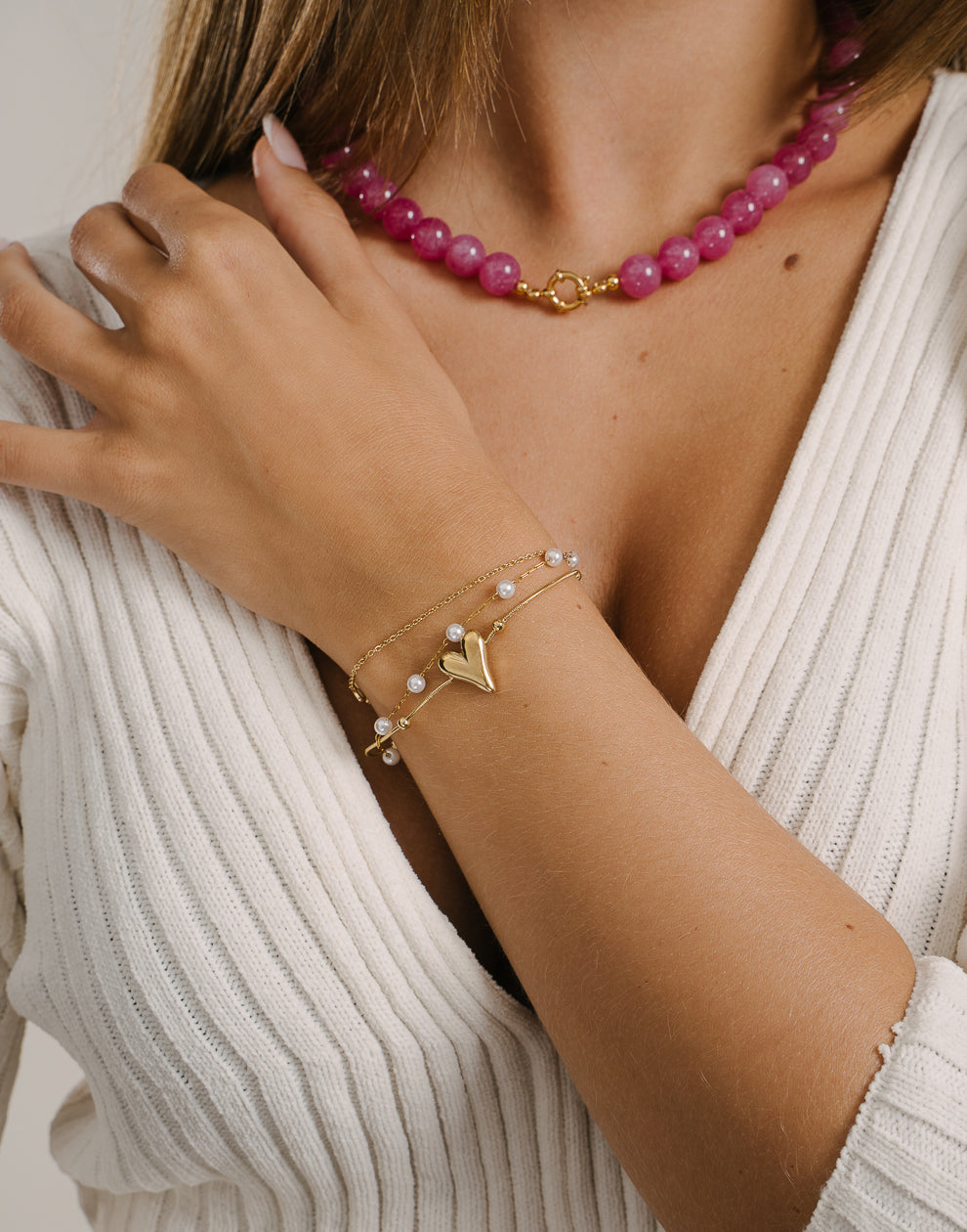 Armband mit Herzen und Perlen, goldfarben