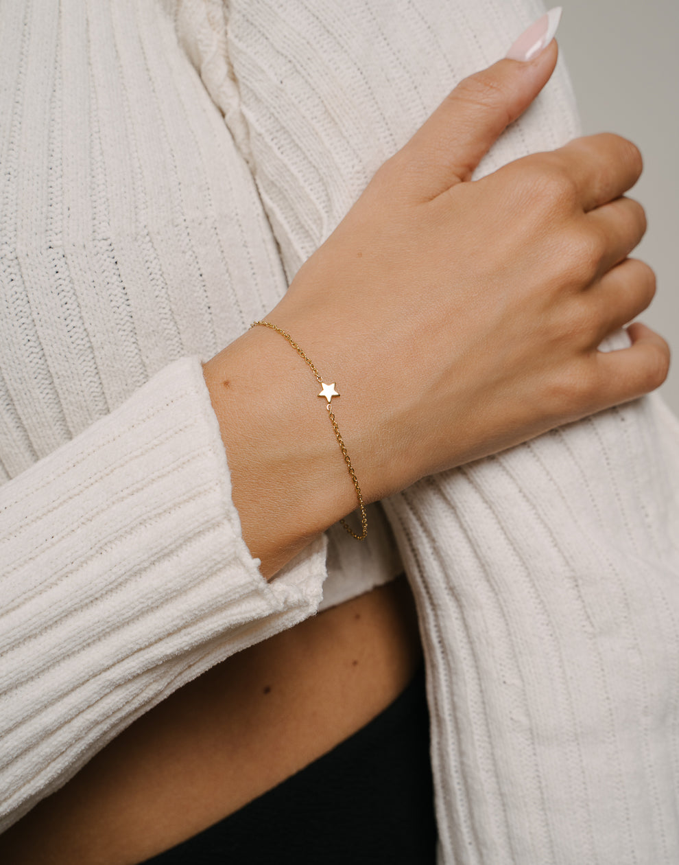 Armband kleine ster goudkleurig