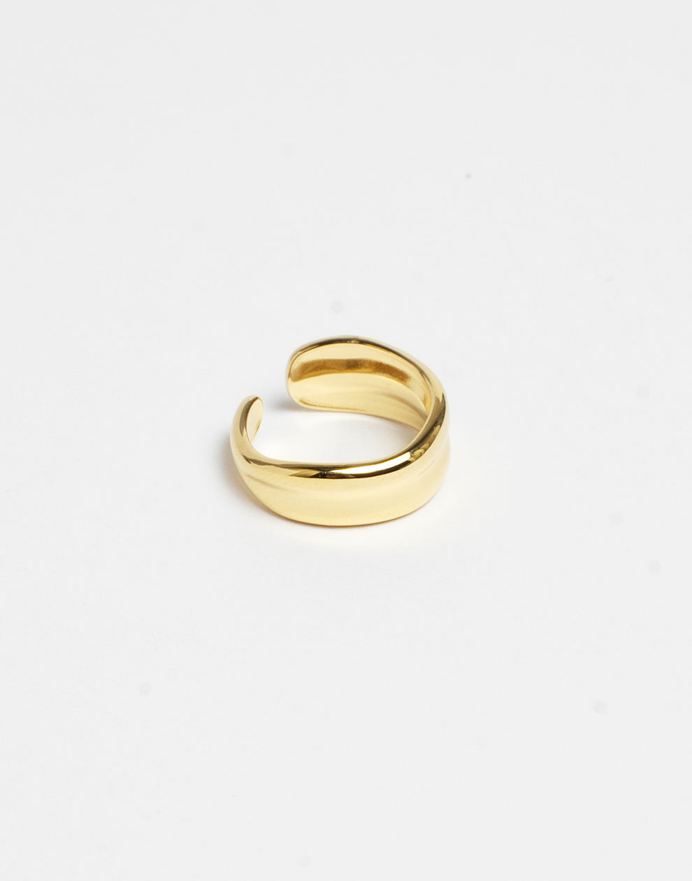 Ring curved asymmetrical gold-colored
