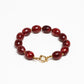 Kralenarmband ovaal bordeaux