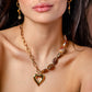 Kralenketting ovaal met schakels hart bruin