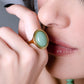 Ring met grote ovale steen lichtgroen