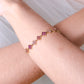 Armband mit Kleeblättern und Strasssteinen in Rosa