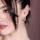 Twisted hoops steentjes goudkleurig