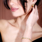 Twisted hoops steentjes goudkleurig