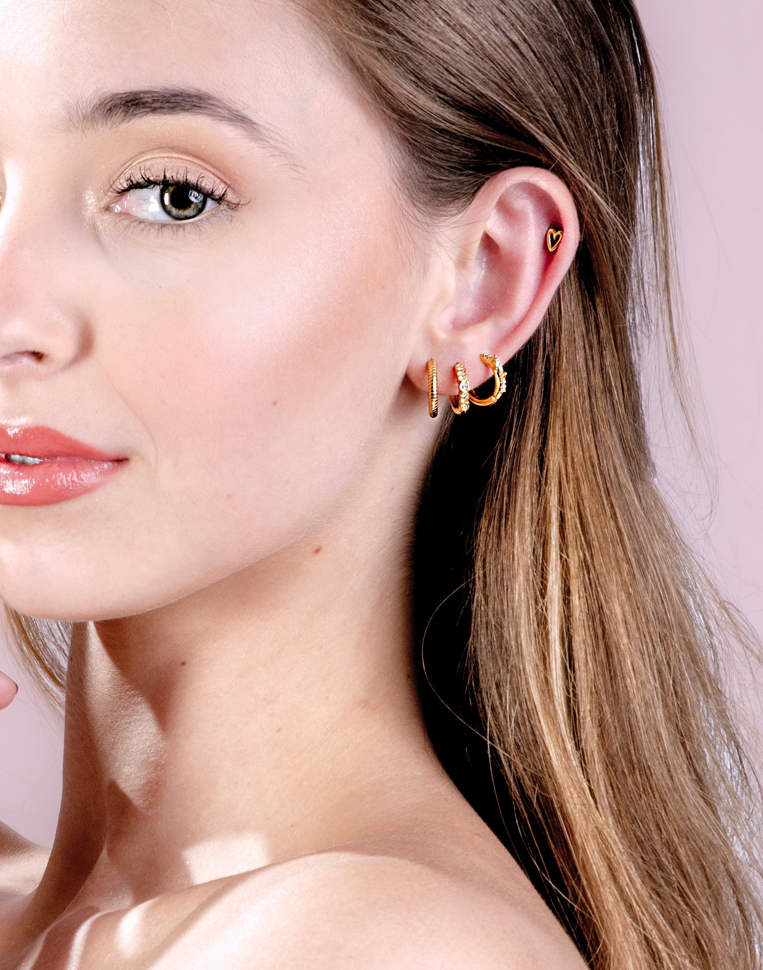 Creolen hartjes met steentjes goudkleurig