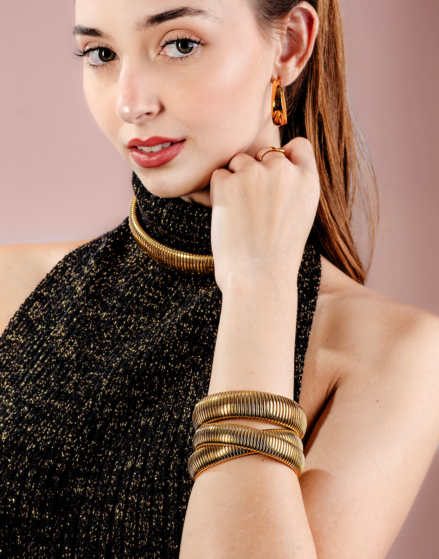 Stretch armband dubbel breed goudkleurig