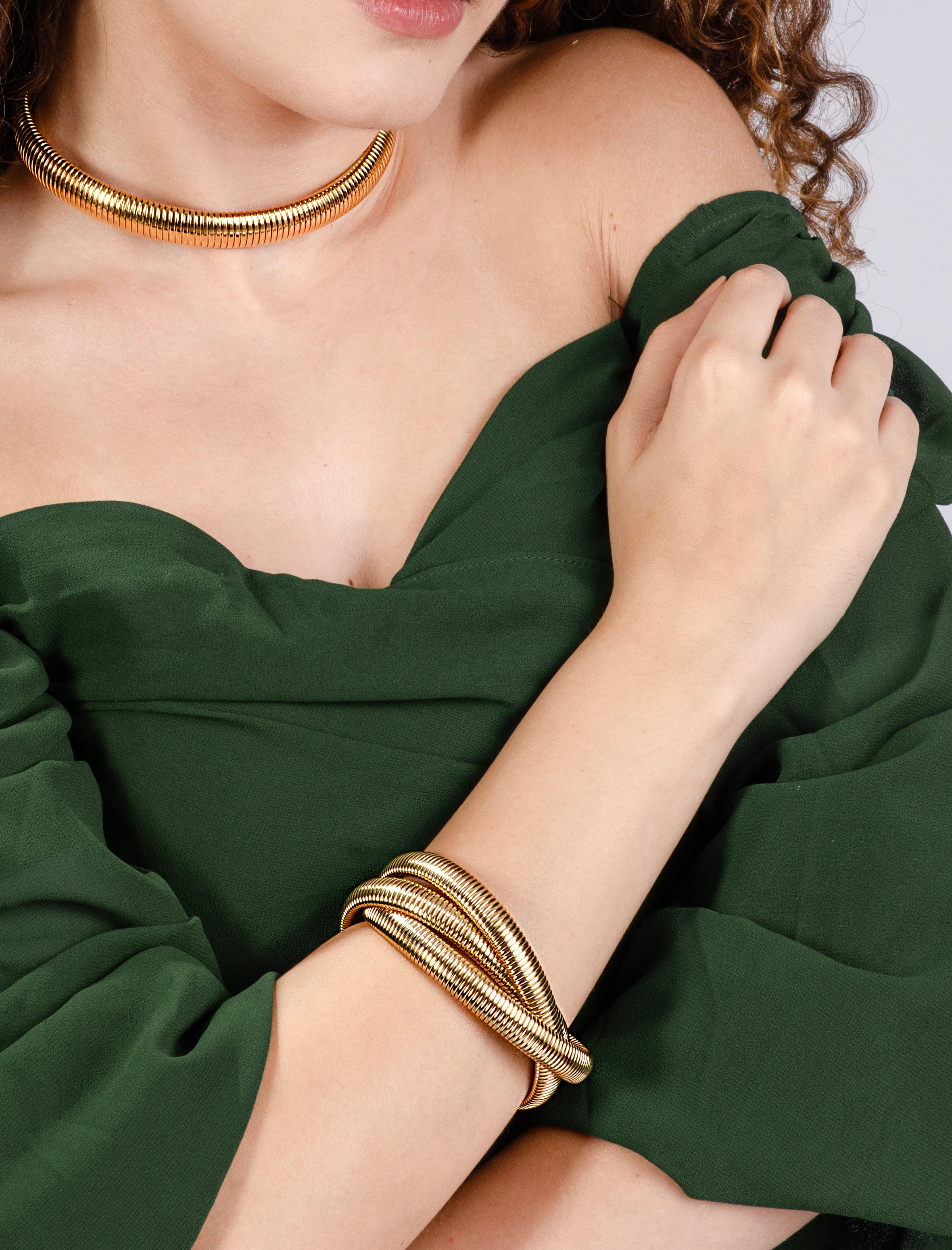 Stretch armband triple goudkleurig