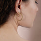Hoops with gold-colored balls