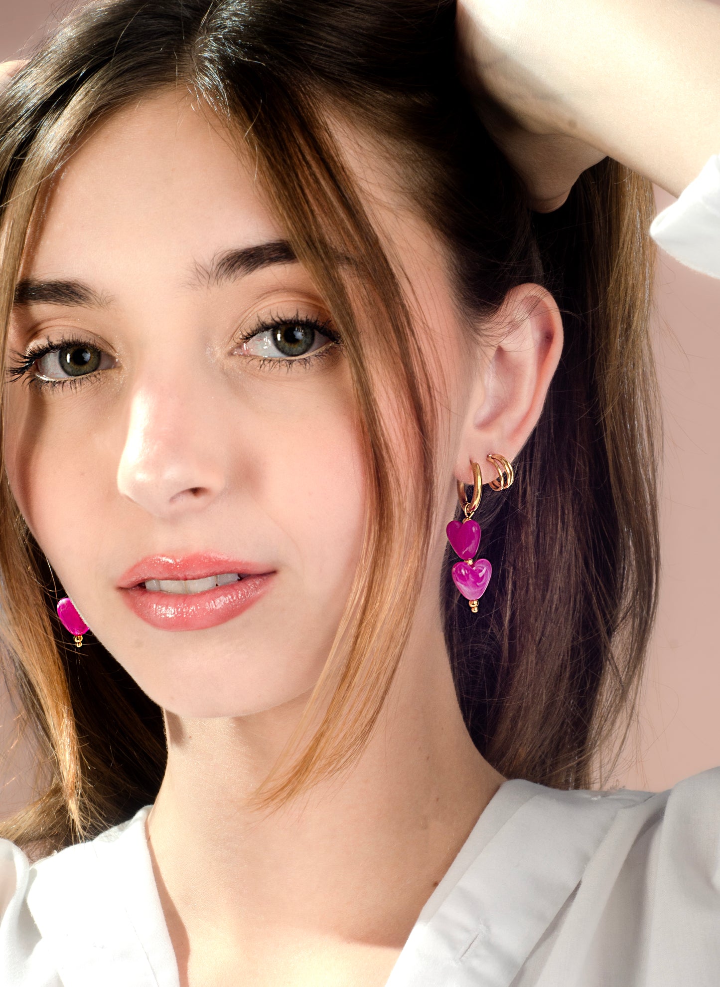 Hartjes kralenoorbellen fuchsia