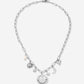 Silver-colored smiley stars charm necklace