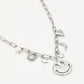 Silver-colored smiley stars charm necklace