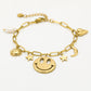 Bedelarmband smiley stars goudkleurig
