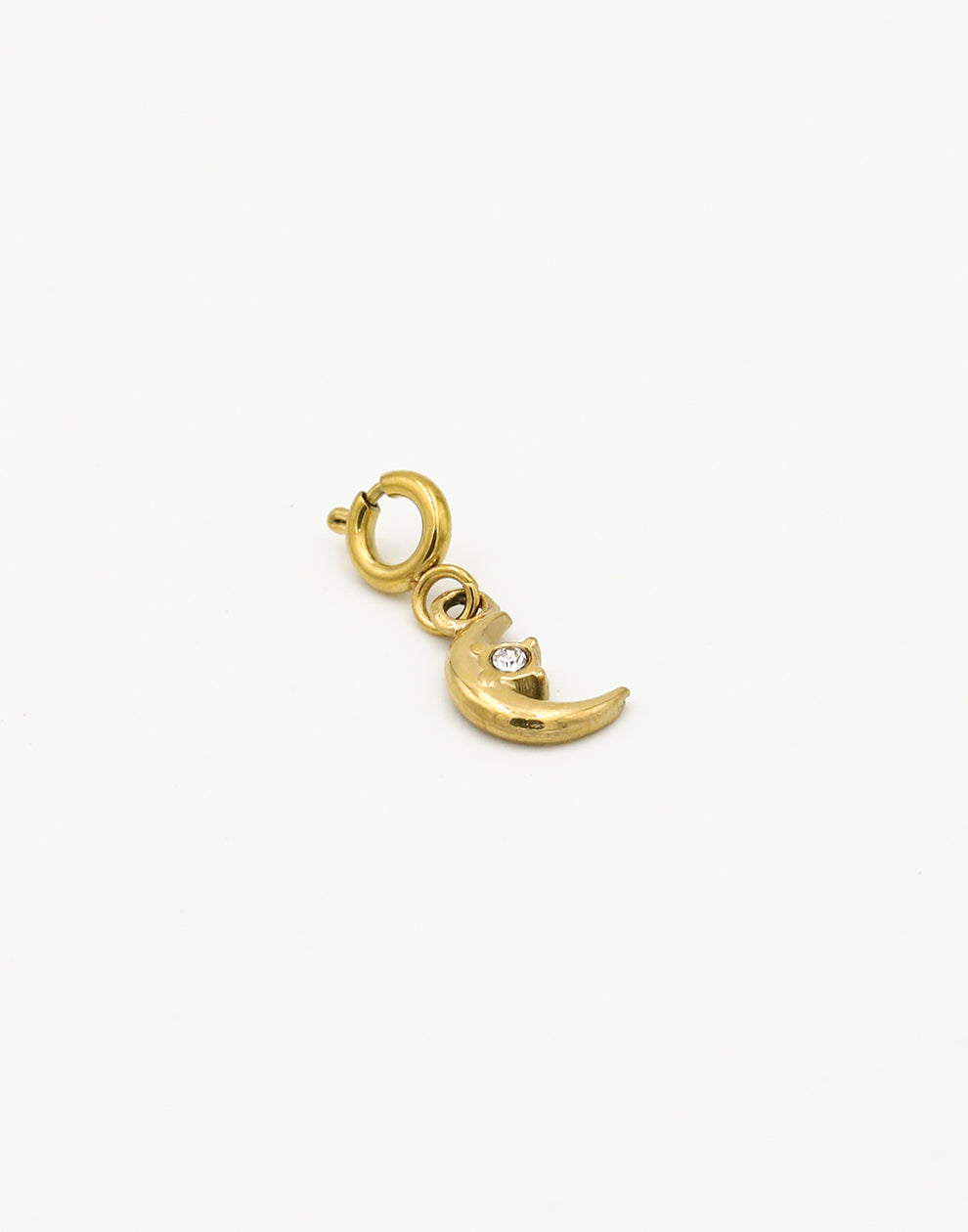 Loose gold-colored moon charm