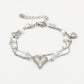 Armband hartjes en parels zilverkleurig