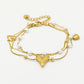Armband hartjes en parels goudkleurig