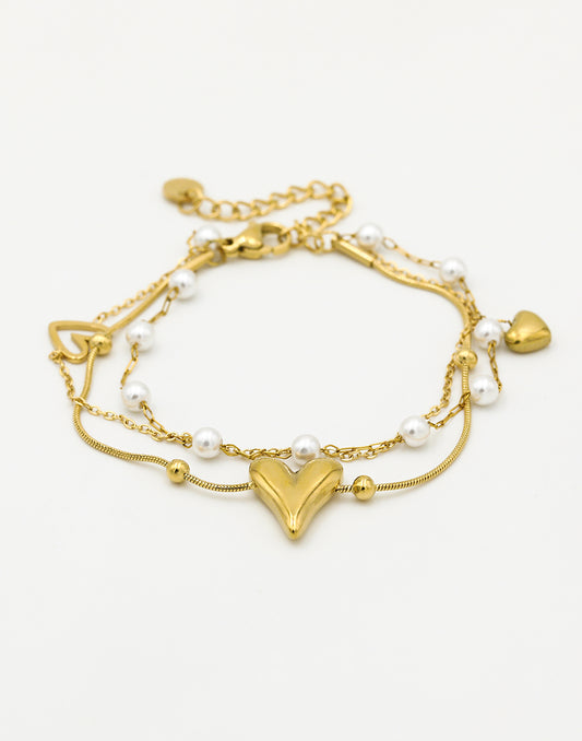 Armband hartjes en parels goudkleurig