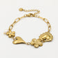 Bedelarmband hartjes en bloemen