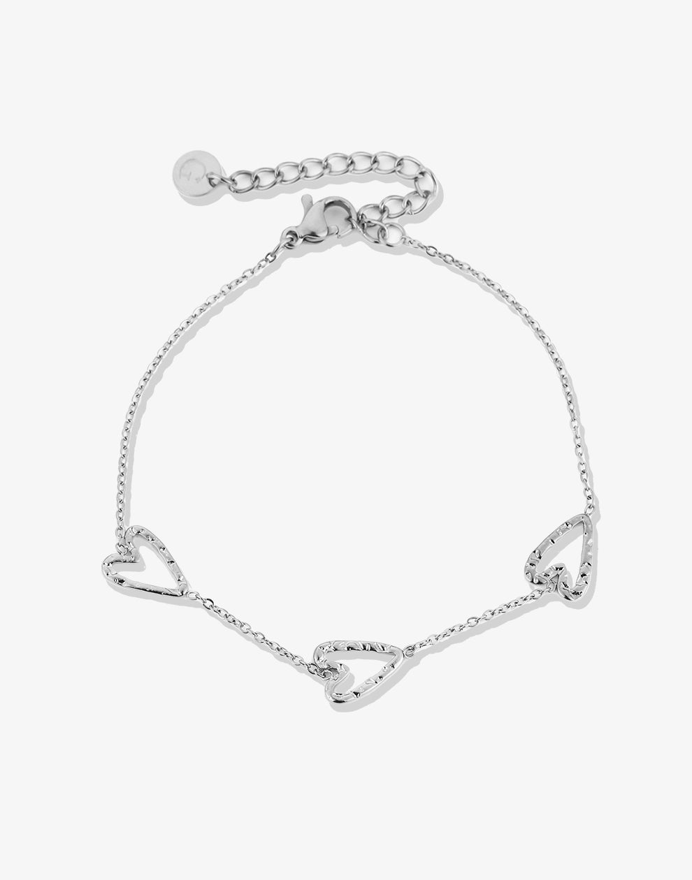 Armband drie geslagen hartjes zilverkleurig