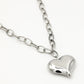 Lange schakelketting met chunky hart zilverkleurig