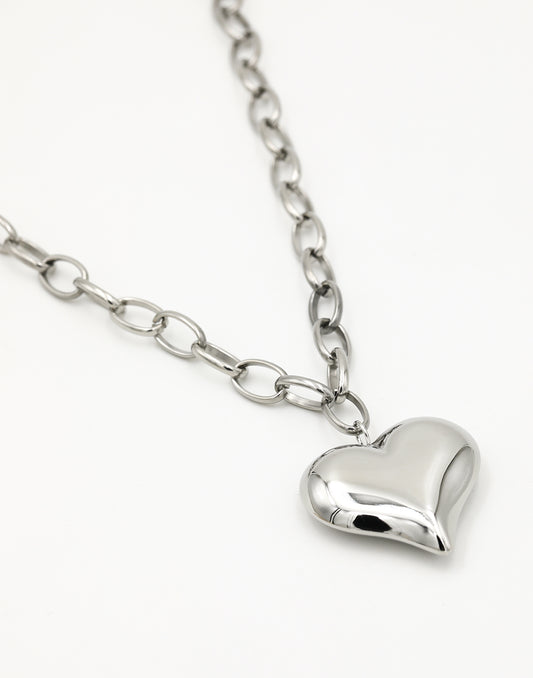 Lange schakelketting met chunky hart zilverkleurig