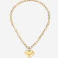 Lange schakelketting met chunky hart goudkleurig