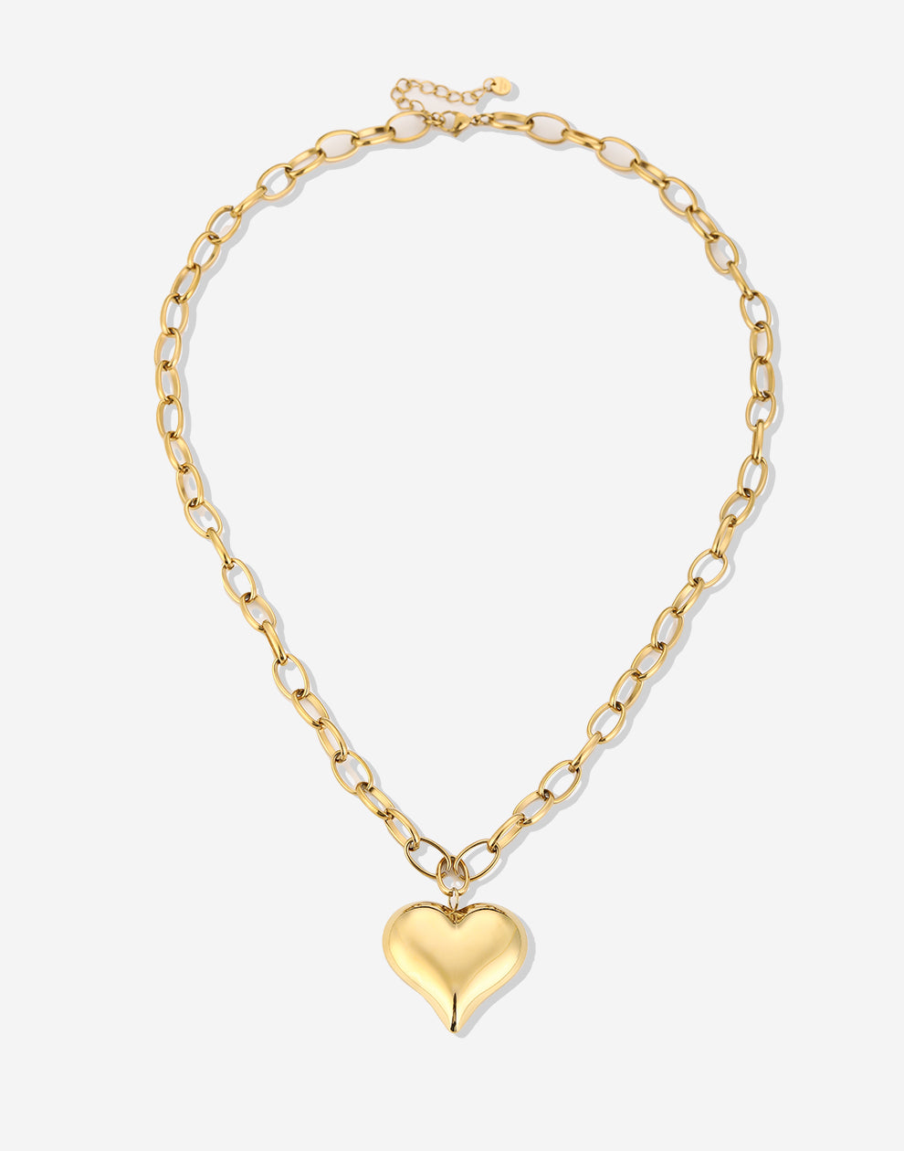 Lange schakelketting met chunky hart goudkleurig
