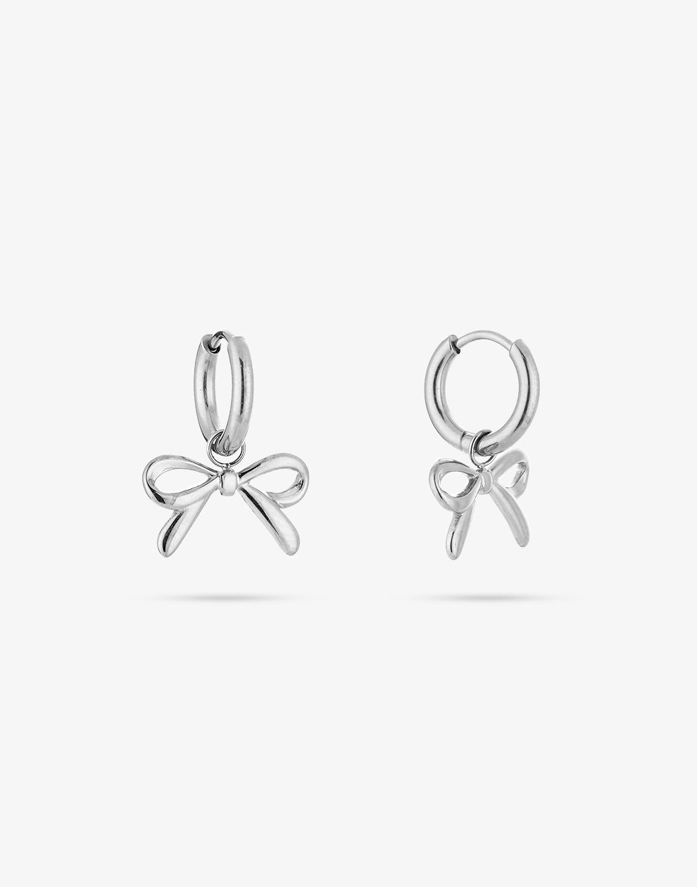 Silver-colored bow earrings