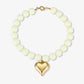 Kralenketting pastel met hart beige