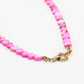 Pink beaded necklace with hearts