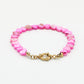 Kralenarmband hartjes roze