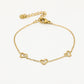 armband drie speelse hartjes goudkleurig