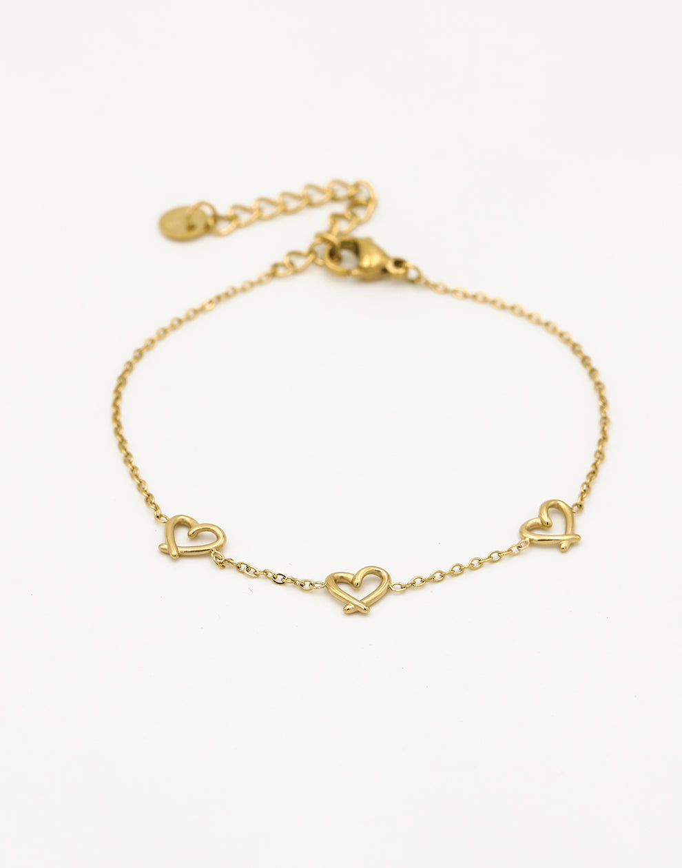 armband drie speelse hartjes goudkleurig
