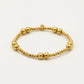 Stretch armband mix stalen kralen goudkleurig