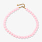 Roze kralenketting