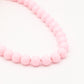 Roze kralenketting