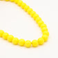 Gele kralenketting