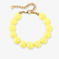 Gele kralenarmband