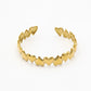 Bangle hartjes patroon goudkleurig