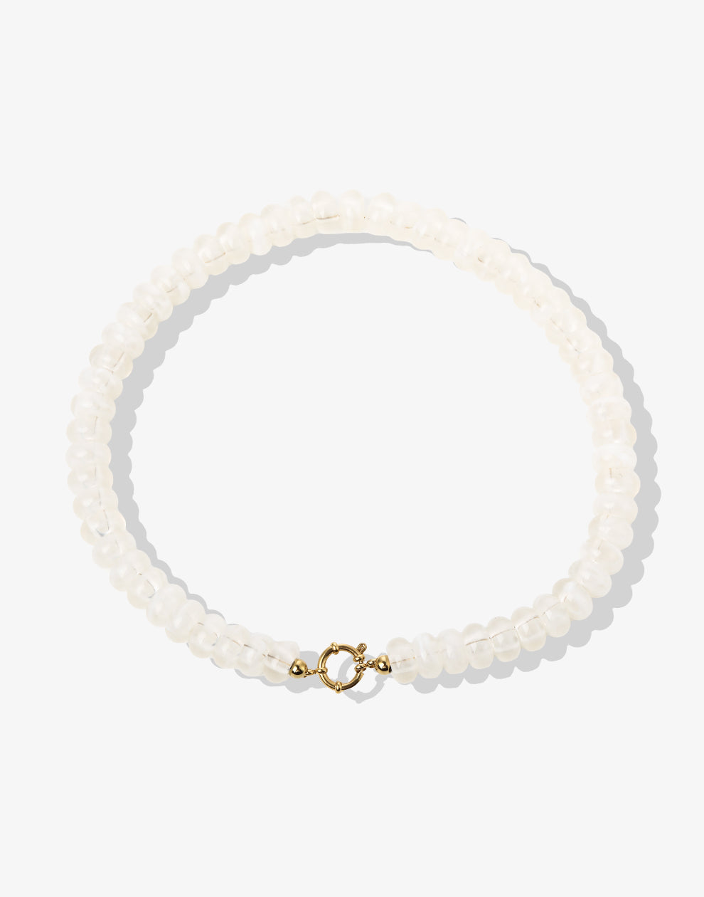 Kralenketting ovaal met slotje beige