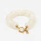Kralenarmband ovaal met slotje beige