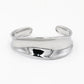 Bangle asymmetrisch gebogen zilverkleurig