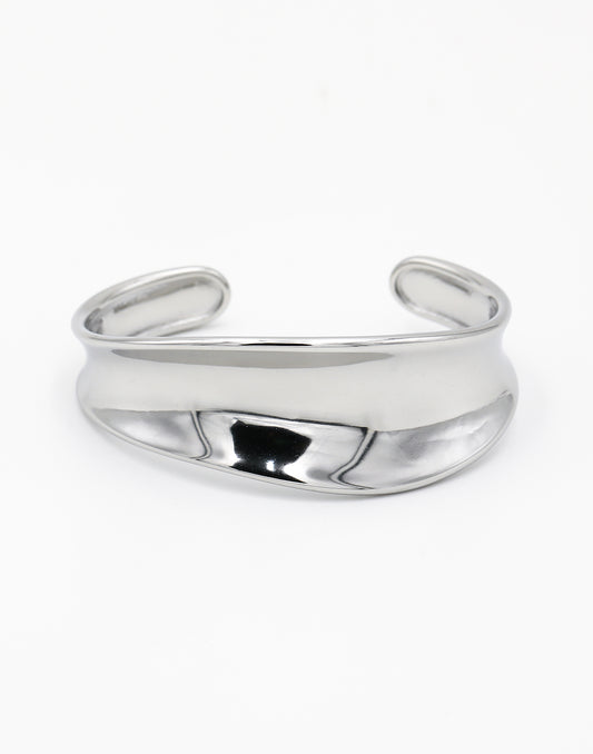 Bangle asymmetrisch gebogen zilverkleurig